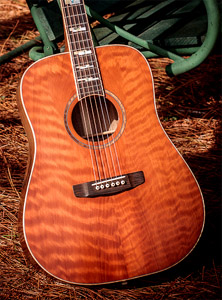 Grafted Walnut with Curly Redwood top by Dale Humphries of Smooth Stone guitars (www.smoothstoneguitars.com) for Richard Stroud